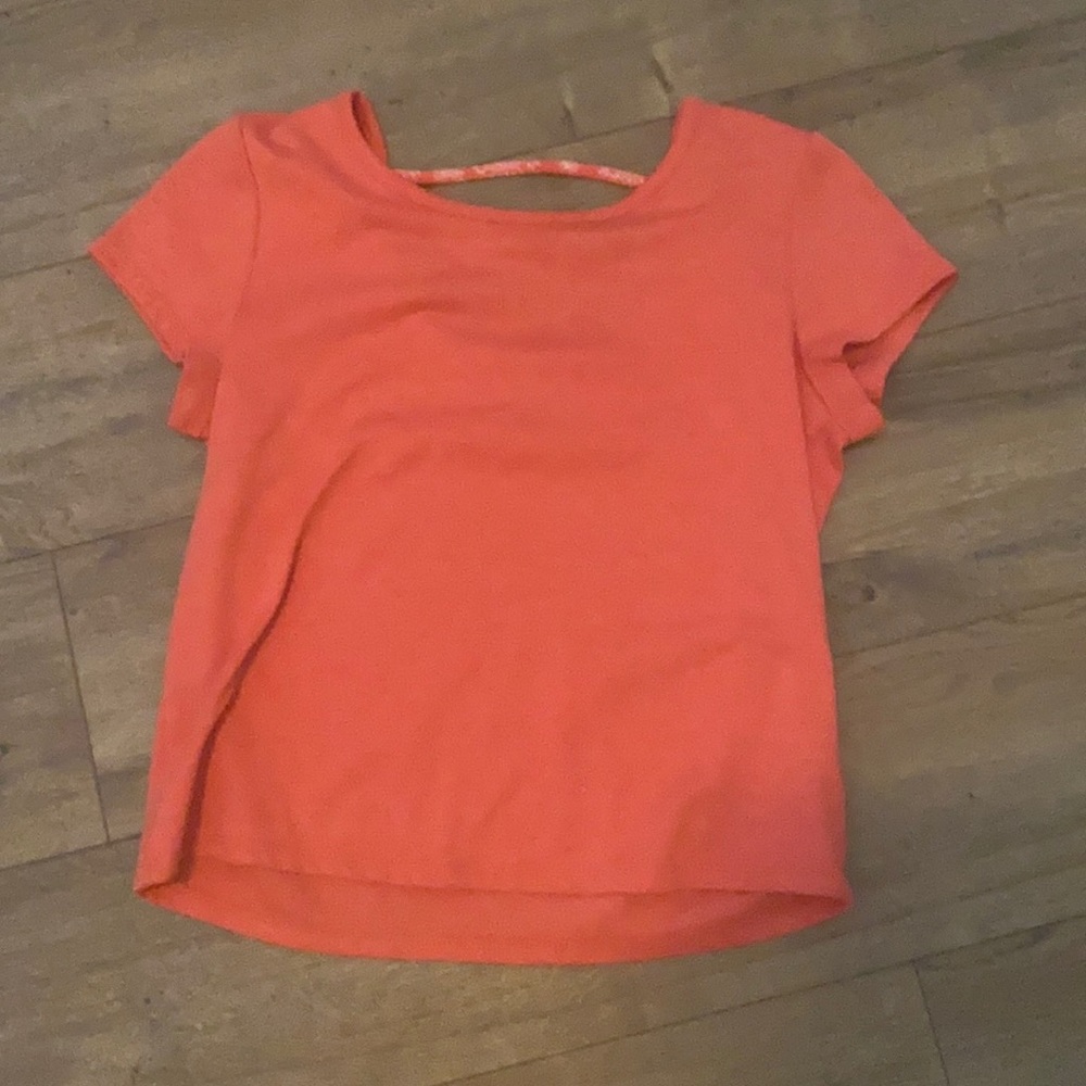 This is a pink crop top and is nice for summer.